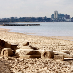 F1 car racing on the beach